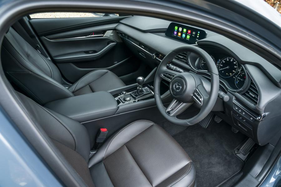 Интерьер Mazda3 Skyactiv-G GT Sport Hatchback 2019 года  (UK) (фото 55 из 83)